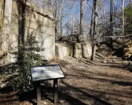  ?? WALTER NICKLIN For The Washington Post ?? A limestone ‘cliff’ remains where building blocks for the U.S. Capitol were split away.