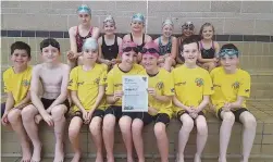  ??  ?? Line-up Livi swimmers celebrate their award