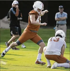  ?? RALPH BARRERA / AMERICAN-STATESMAN ?? Kicker Josh Rowland already has earned praise from Texas coach Tom Herman, who likes Rowland’s toughness.