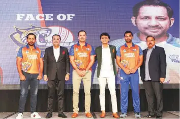  ?? Courtesy: Bengal Tigers ?? Tamim Iqbal (second from right), who will be the brand ambassador of the Bengal Tigers, with Pakistan’s Sarfraz Ahmad, Afghanista­n’s Mohammad Nabi and team mentor Anis Sajan and team owners Rizwan Sajan and Neelesh Bhatnagar.