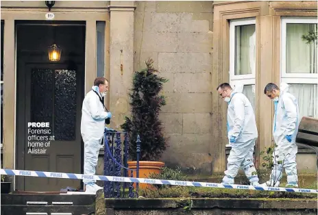  ?? ?? PROBE Forensic officers at home of Alistair