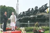  ?? PIC/PTI ?? Prime Minister Narendra Modi with Indonesian President Joko Widodo at the Arjuna Wijaya Chariot statue in Jakarta, Indonesia, on Wednesday