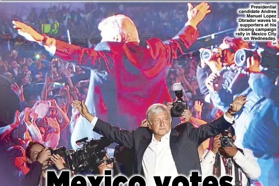  ?? AP ?? Presidenti­al candidate Andres Manuel Lopez Obrador waves to supporters at his closing campaign rally in Mexico City on Wednesday.