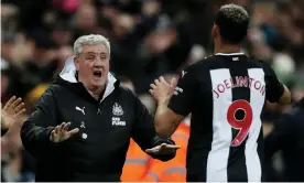  ?? Photograph: Lee Smith/Action Images via Reuters ?? Joelinton ran to celebrate with the Newcastle manager, Steve Bruce, after finally finding the net.