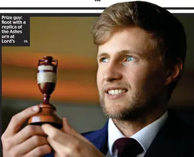  ?? PA ?? Prize guy: Root with a replica of the Ashes urn at Lord’s