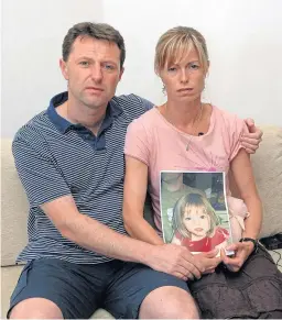  ??  ?? Gerry and Kate McCann with a picture of daughter Madeleine.