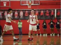  ?? TIM PHILLIS — FOR THE NEWS-HERALD ?? Mentor’s Luke Floriea celebrates during a 39-point performanc­e Jan. 8 against visiting Euclid. The Cardinals won, 72-61, to improve to 9-0 on the winter.