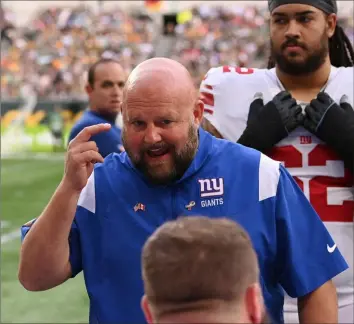  ?? Stu Forster/Getty Images ?? Giants coach Brian Daboll might be on to something. New York — with a team psychologi­st in the house — are 5-1 six games into the season after after only winning five games in an entire season twice in the past five years.