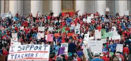  ?? ALEX FLYNN / NEW YORK TIMES ?? Protesters support higher teacher pay Feb. 27 in Charleston, W.Va. Fiscal austerity has cut deeply into public education in conservati­ve states.
