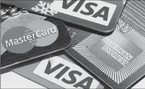  ?? TRIBUNE NEWS SERVICE ?? The use of chip cards instead of the magnetic-stripe credit cards has caused more holidaysea­son thieves to move toward online shopping fraud.