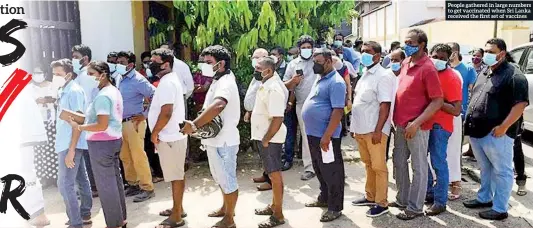  ??  ?? People gathered in large numbers to get vaccinated when Sri Lanka received the first set of vaccines