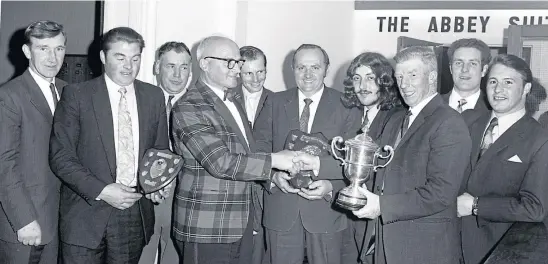  ?? ?? Thanks go to one of our Arbroath readers for this great shot from April 21 1972, when these members of Monikie Men’s Club gathered at their annual presentati­on night in the Abbey Suite at the Viewfield Hotel, Arbroath. Do you recognise anyone in the line-up?