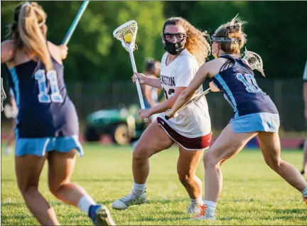  ?? JAMES BEAVER — FOR MEDIANEWS GROUP ?? Abington’s Abby Johnson (33) cuts around North Penn’s Danielle Preston (10) in the opening round of district playoffs Tuesday, May 18, 2021 at Abington High School.