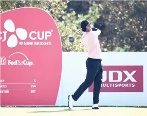  ?? — AFP photo ?? Scott Piercy of the US tees off on the twelfth hole during the second round of the CJ Cup golf tournament at Nine Bridges golf club in Jeju Island on October 19, 2018.