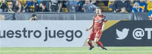  ?? AZAEL RODRIGUEZ/GETTY IMAGES ?? TFC’s Sebastian Giovinco scored his team's second goal on a free kick in the second leg of a Champions League quarterfin­al against Tigres UANL on Tuesday.