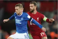  ?? ?? Steven Davis in action against Liverpool in a disappoint­ing Group A campaign