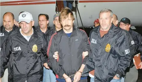  ?? U.S. DEPARTMENT OF JUSTICE 2010 ?? Russian arms dealer Viktor Bout arrives in White Plains, N.Y., from Thailand after he was arrested during a sting operation.