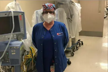  ?? Photo courtesy of Maureen May ?? Maureen May, a nurse at Temple University Hospital and president of the Pennsylvan­ia Associatio­n of Staff Nurses and Allied Profession­als union, says her colleagues are making do with one surgical mask per day.