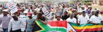  ??  ?? Bulawayo residents march to White City Stadium yesterday to register their displeasur­e at the illegal sanctions (Picture by Eliah Saushoma)
