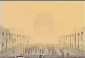  ?? SANCHIT KHANNA/HT PHOTO ?? India Gate shrouded in smog during winter last year. The National Clean Air Programme covers 132 cities in India that do not meet prescribed national ambient air quality levels.