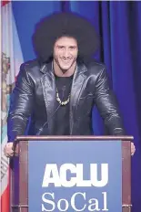  ?? AP FILE ?? Colin Kaepernick, shown at an ACLU event in 2017, had his workout with the Seahawks postponed because the quarterbac­k declined to stop kneeling during the national anthem.