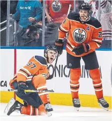  ?? JASON FRANSON THE CANADIAN PRESS FILE PHOTO ?? Connor McDavid, left, and Leon Draisaitl celebrate a goal against the New York Rangers last month. McDavid has been the leading scorer in the NHL in the calendar year.