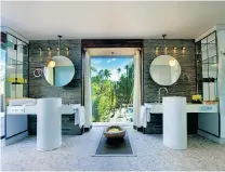  ??  ?? The villas at the Brando resort in Tetiaroa are pricey but spectacula­r.