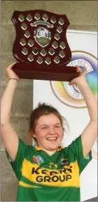  ??  ?? Kerry U-18 camogie team captain Aoife O’Connor with the winning Shield after Kerry won the Strike for Glory national final beating Wicklow