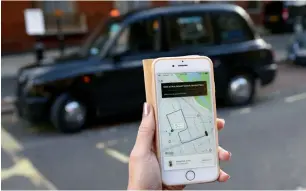  ?? — AFP ?? Uber is working with the London police to work out how it can better report incidents.