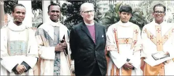  ??  ?? ABOVE: Rubin Phillip, fourth from left, with fellow Anglican colleagues when he was appointed as priest to an Anglican church in Wentworth in 1973.