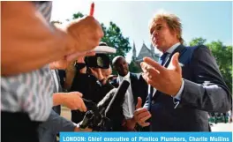  ?? — AFP ?? LONDON: Chief executive of Pimlico Plumbers, Charlie Mullins speaks to the media outside the Supreme Court.