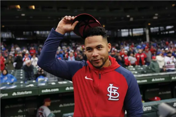  ?? ARMANDO L. SANCHEZ, ARMANDO L. SANCHEZ — CHICAGO TRI ?? Cardinals catcher Willson Contreras watches the video board as the Cubs play a clip honoring their former catcher before the game Monday, May 8, 2023, at Wrigley Field.