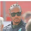  ?? FOTO: DPA ?? Äußerlich cool: Weltmeiste­r Lewis Hamilton.