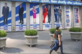  ?? TED SHAFFREY — THE ASSOCIATED PRESS FILE ?? Images of Fox News personalit­ies, from left, Tucker Carlson, Sean Hannity, Laura Ingraham, Maria Bartiromo, Stuart Varney, Neil Cavuto and Charles Payne appear outside News Corporatio­n headquarte­rs in New York on July 31, 2021.