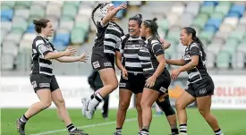  ?? GETTY IMAGES ?? Hawke’s Bay celebrate after Amelia Pasikala, second from right, scored to seal the win over the Northland Kauri at McLean Park yesterday.