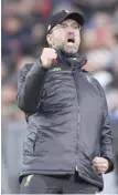  ?? — AFP ?? Liverpool’s German Manager Jurgen Klopp celebrates his side’s goal against Bayern Munich.