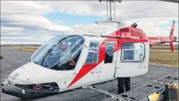  ?? BENOIT LALONDE PHOTO ?? Helicopter used as transport for collecting water samples from close to 60 lakes in Yarmouth and Digby counties.