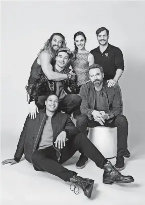  ??  ?? The Justice League assembled (clockwise from bottom left): Ray Fisher, Jason Momoa, Ezra Miller, Gal Gadot, Henry Cavill and Ben Affleck. CHIA JAMES