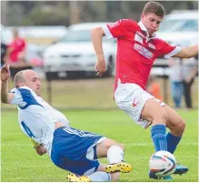  ??  ?? Nikola Jurkovic is tackled by South’s Michael Eagar.