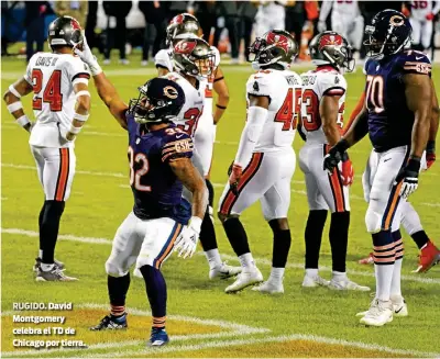  ??  ?? RUGIDO. David Montgomery celebra el TD de Chicago por tierra.