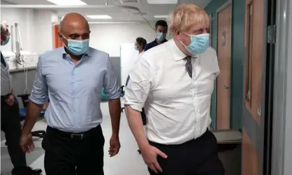  ?? Photograph: Christophe­r Furlong/Getty Images ?? Prime minister Boris Johnson and health secretary Sajid Javid during a visit to Leeds general infirmary earlier this month.