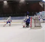  ?? Michael Fornabaio/Hearst Connecticu­t Media ?? The Bridgeport Islanders practiced at Ralph Walker Rink in New Haven on Monday. Goalie coach Chris Terreri, 58, filled in at one goal for the practice.