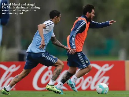  ??  ?? Lionel Messi and Angel De Maria during a training session of the Argentine national squad.