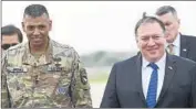  ?? Jung Yeon-je Pool Photo ?? GEN. Vincent Brooks, left, with Mike Pompeo upon the secretary of State’s arrival in South Korea.