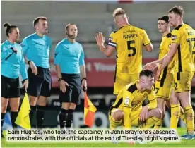  ?? ?? Sam Hughes, who took the captaincy in John Brayford’s absence, remonstrat­es with the officials at the end of Tuesday night’s game.