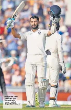  ?? AP ?? Cheteshwar Pujara celebrates after completing his century against England on Friday.