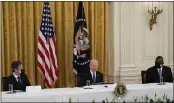  ?? EVAN VUCCI — THE ASSOCIATED PRESS ?? Secretary of State Antony Blinken, left, and Secretary of Defense Lloyd Austin listen as President Joe Biden speaks during a Cabinet meeting in the East Room of the White House in Washington on Thursday.