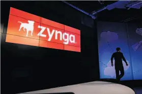  ?? Paul Sakuma / Associated Press ?? Zynga CEO Mark Pincus, who recently dumped 15 percent of his shares for about $198 million, leaves the stage after announcing new games in June.