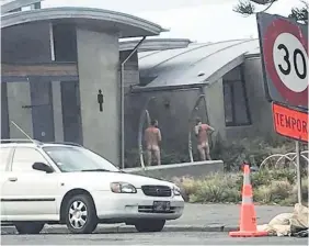  ?? Picture / Facebook ?? This picture posted to the Sumner Facebook community page shows two men showering naked in sight of the Christchur­ch public.