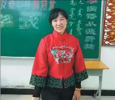  ?? PROVIDED TO CHINA DAILY ?? Yan Wenyun in the classroom for her Manchu language course in Harbin, Heilongjia­ng province.